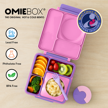 Pink bento box with compartments filled with food