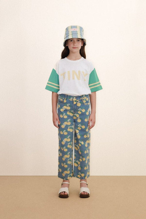 Light wash demin jeans with oranges print