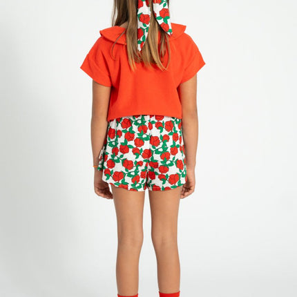 kid wearing red t-shirt 