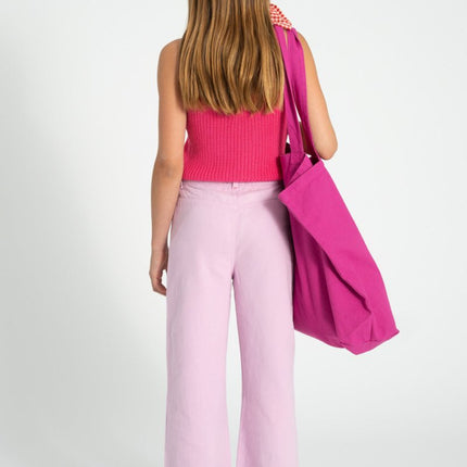 girl wearing a pink top paired with lilac pants