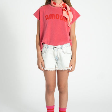 kid wearing pink sleeveless top with amour text print
