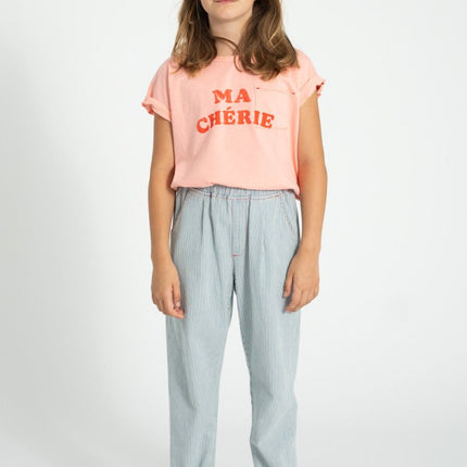 girl wearing pink tshirt with chest pocket 