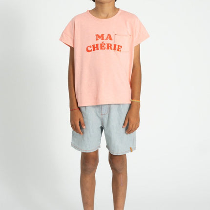 boy wearing pink tshirt detailed with print and chest pocket