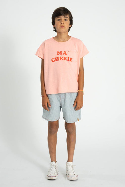boy wearing pink tshirt detailed with print and chest pocket