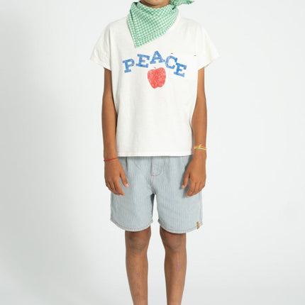 kid wearing white tshirt with peace print 