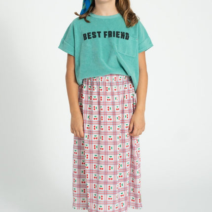 girl wearing torquoise color shirt 