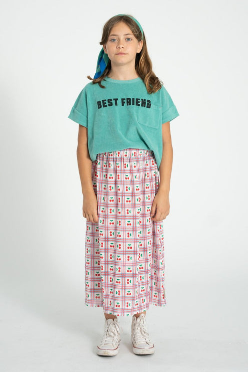 girl wearing torquoise color shirt 