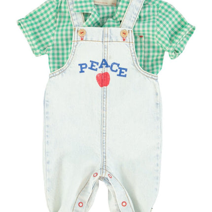 light blue denim overall with green checkered polo 