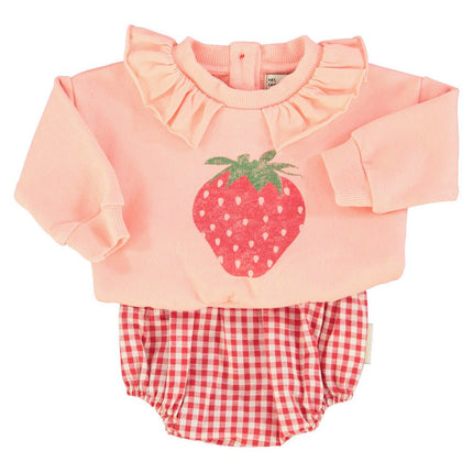pink baby sweatshirt paired with checkered romper