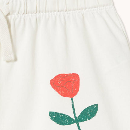 Off-white shorts with a red rose print