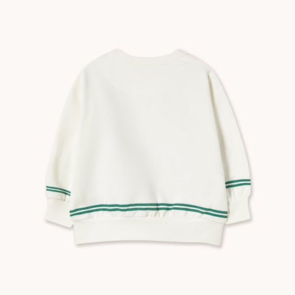 White sweater with green stripes