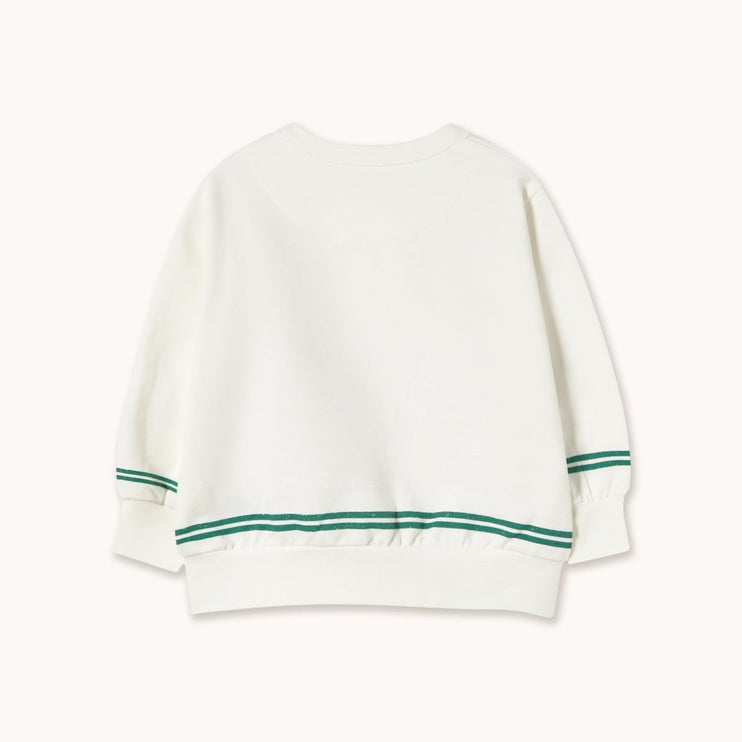 White sweater with green stripes