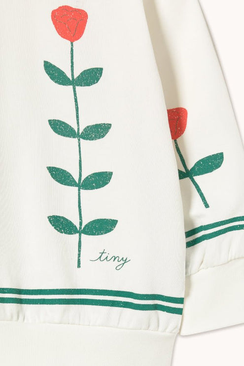 Off-white sweatshirt with red rose and green leaves print