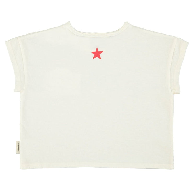 White sleeveless top with a red star on a white background