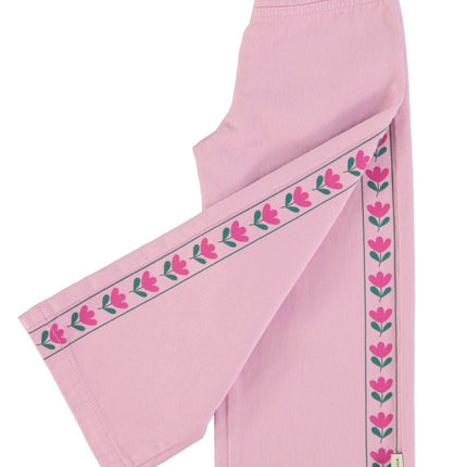 pink pants with flower print on the side 