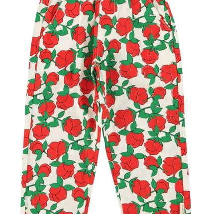 Trousers with red rose pattern on a white background