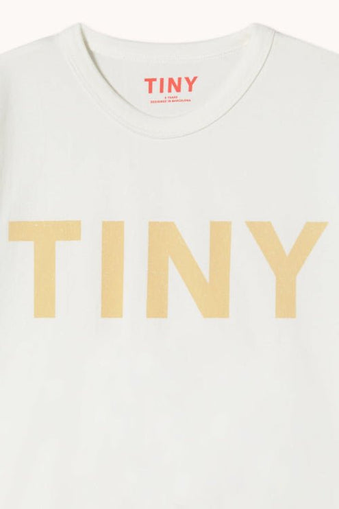 Off-white t-shirt with 'TINY' print