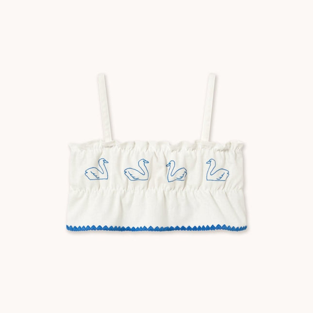 White tank top with blue trim and embroidered swan designs
