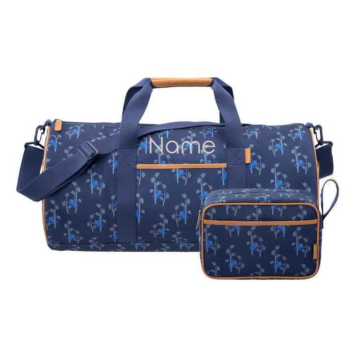 A personalizable navy blue duffel bag with a light blue monkey pattern, tan handles, and a matching zippered pouch.
