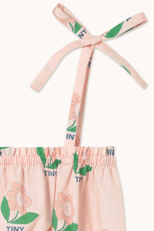 Pastel pink top with green flower print