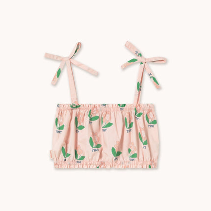 Pink top with green leaf pattern 