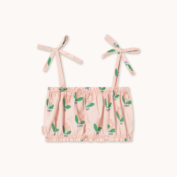 Pink top with green leaf pattern 