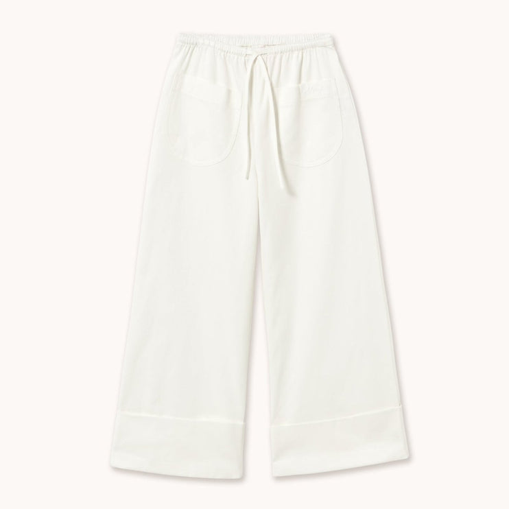 Off white long twill pants with an elastic waistband