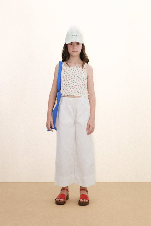 Off-white top with tiny roses print