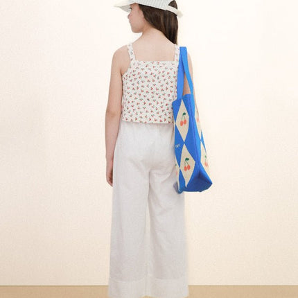 Off-white top with tiny roses print backview