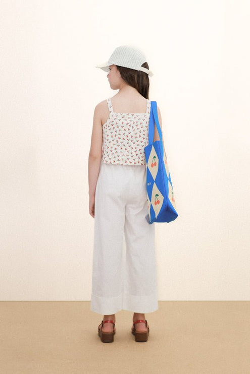 Off-white top with tiny roses print backview