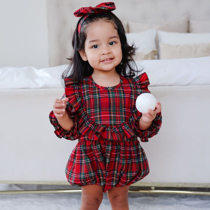 Girl wearing Long Sleeve Tartan romper