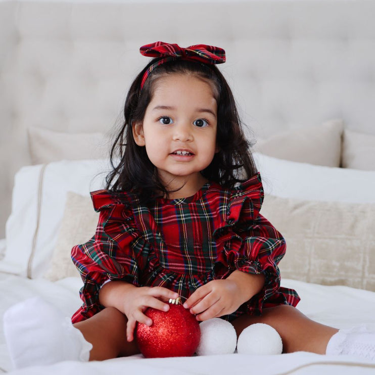 Girl wearing Long Sleeve Tartan romper