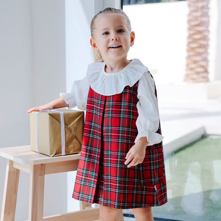 Girl wearing Tartan Pinafore Dress 