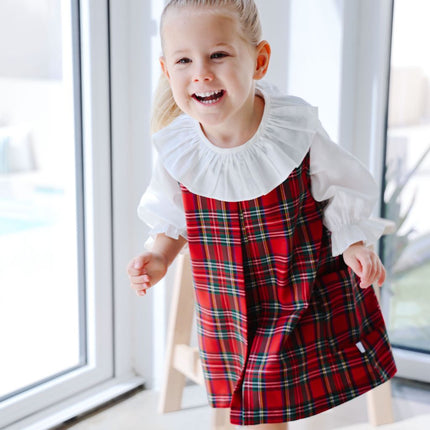 Girl wearing Tartan Pinafore Dress 