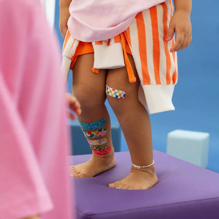 Kid wearing Abstract bandage