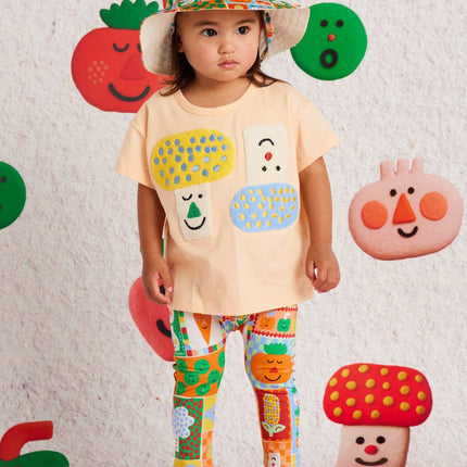 kid wearing a cute tshirt