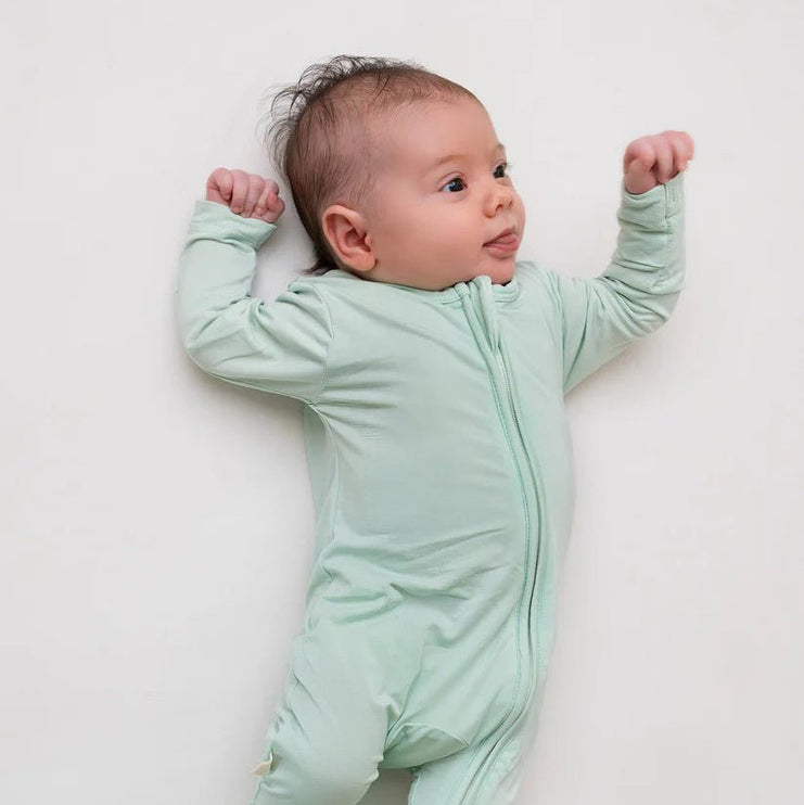 Baby wearing Sage Green Zippered Sleepsuit