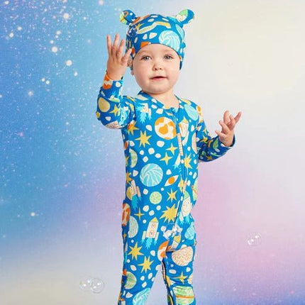 a boy wearing see you in space design longsleeve romper
