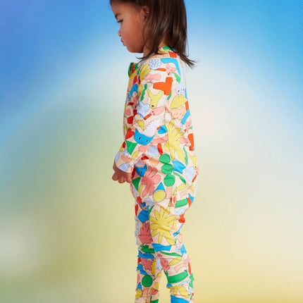 child wearing romper with cute abstract print