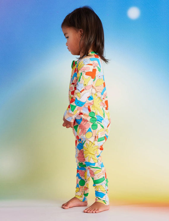 child wearing romper with cute abstract print