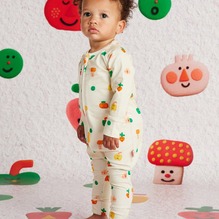 baby wearing a romper with cute print
