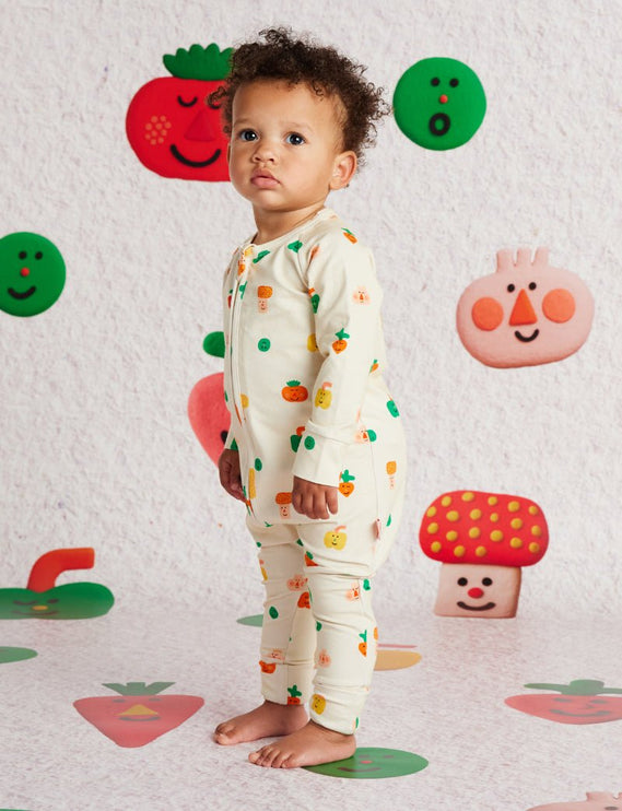 baby wearing a romper with cute print