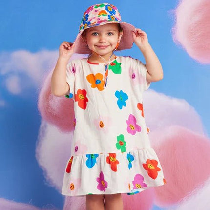 sweet girt wearing hej blomma wooven dress
