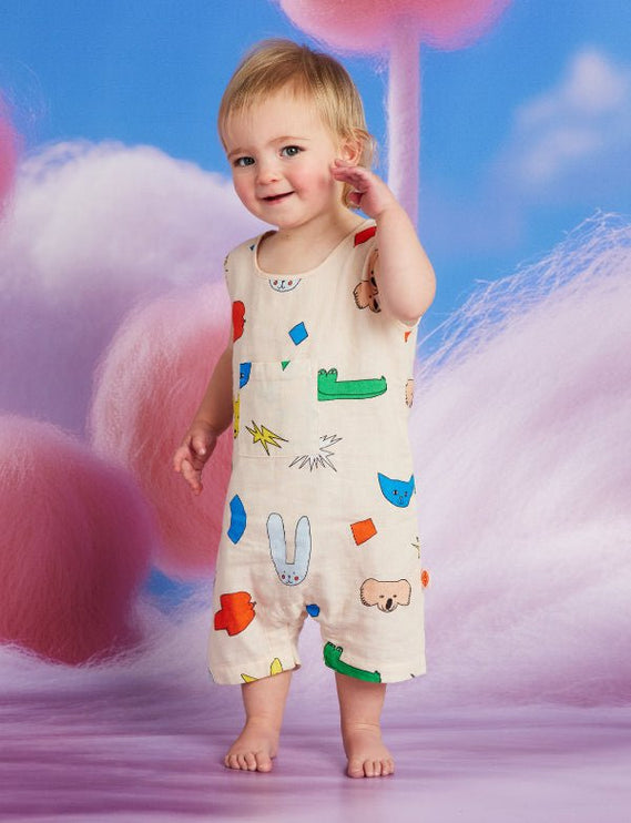 baby wearing romper with billabong print