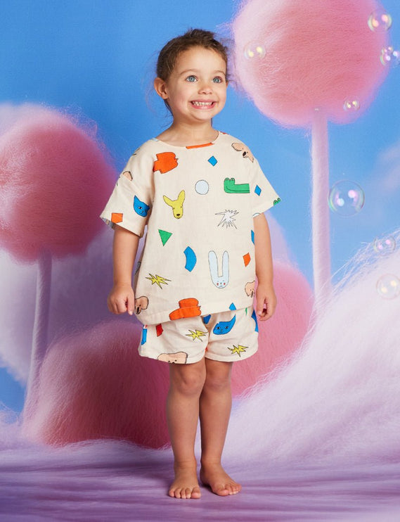 kid wearing matching shirt and short with billabong print