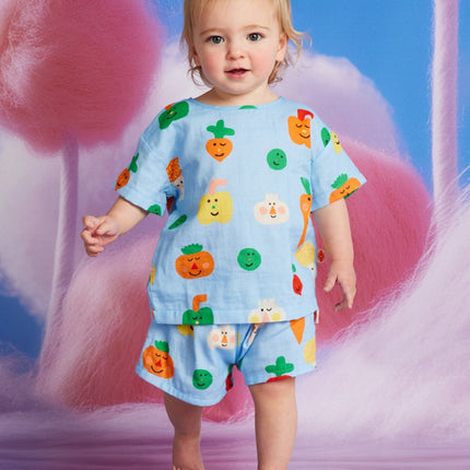 Child wearing a colorful pajama set 