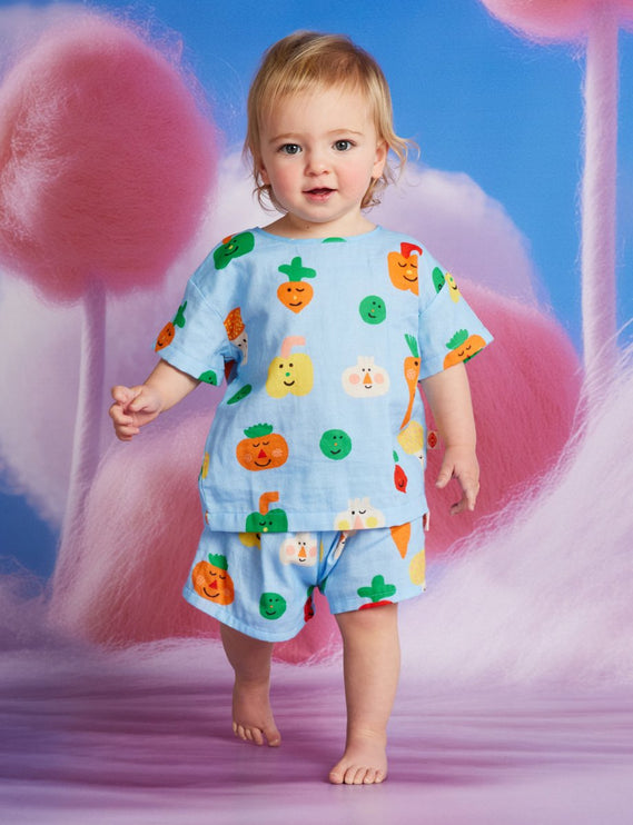 Child wearing a colorful pajama set 