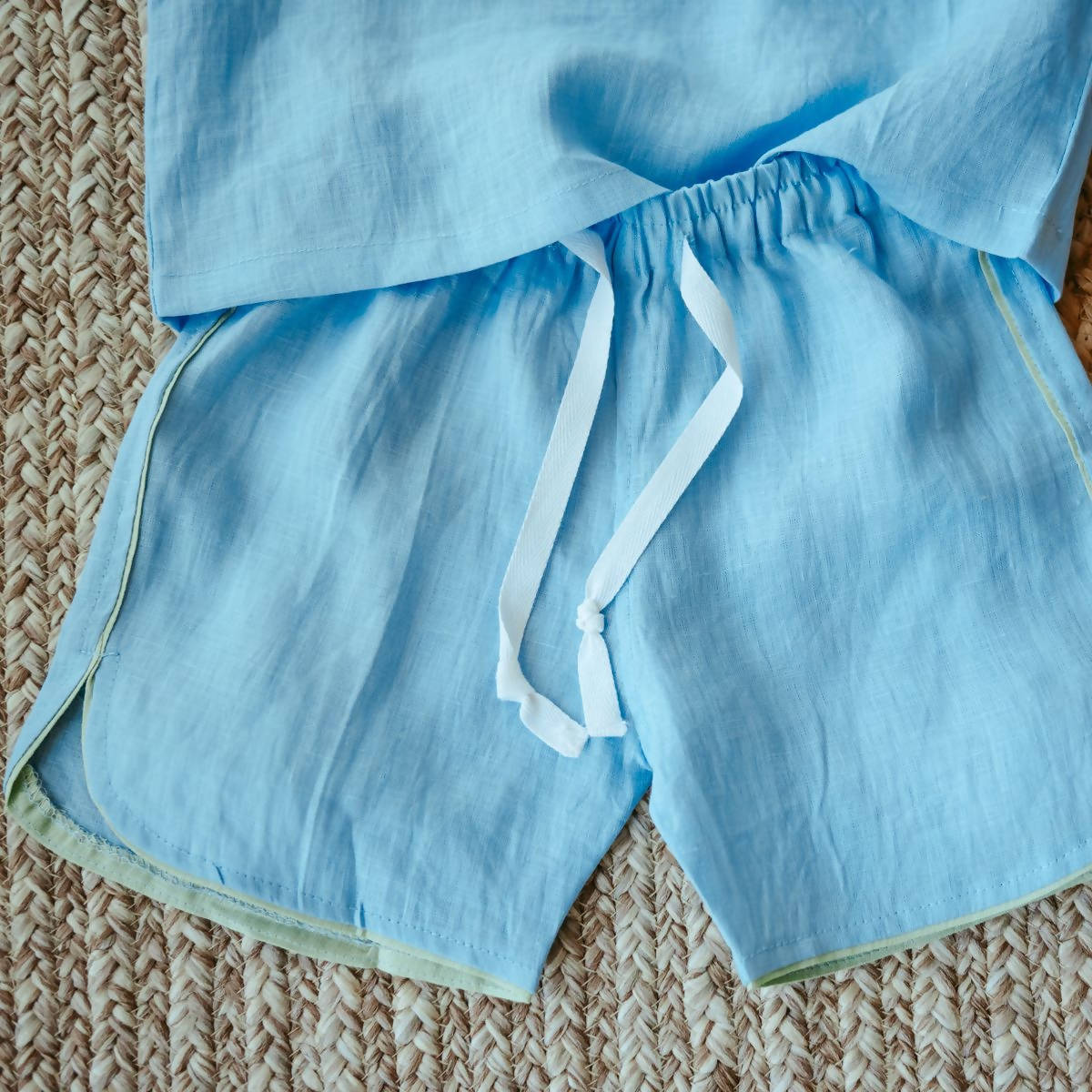 blue shirt and short