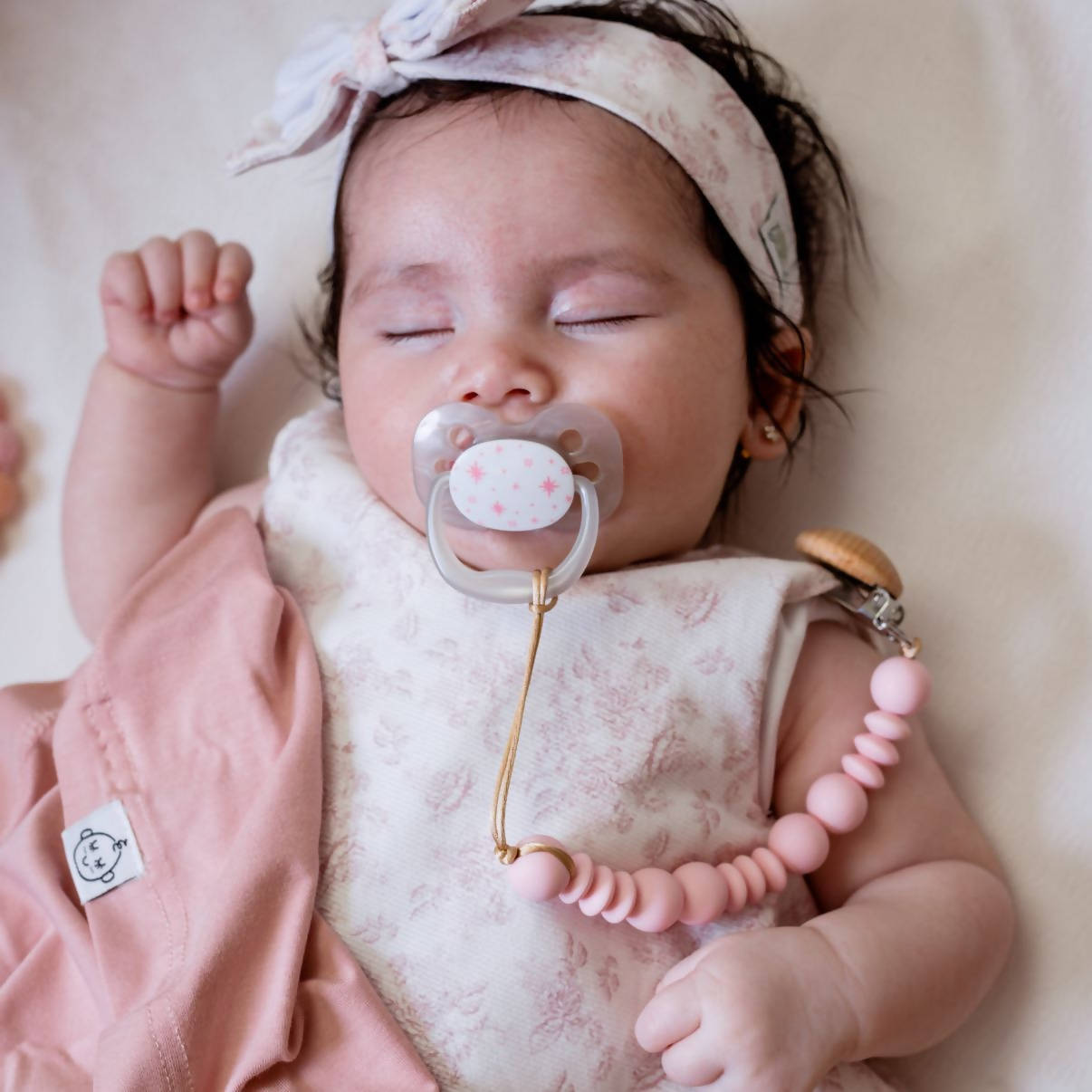 pink pacifier clip